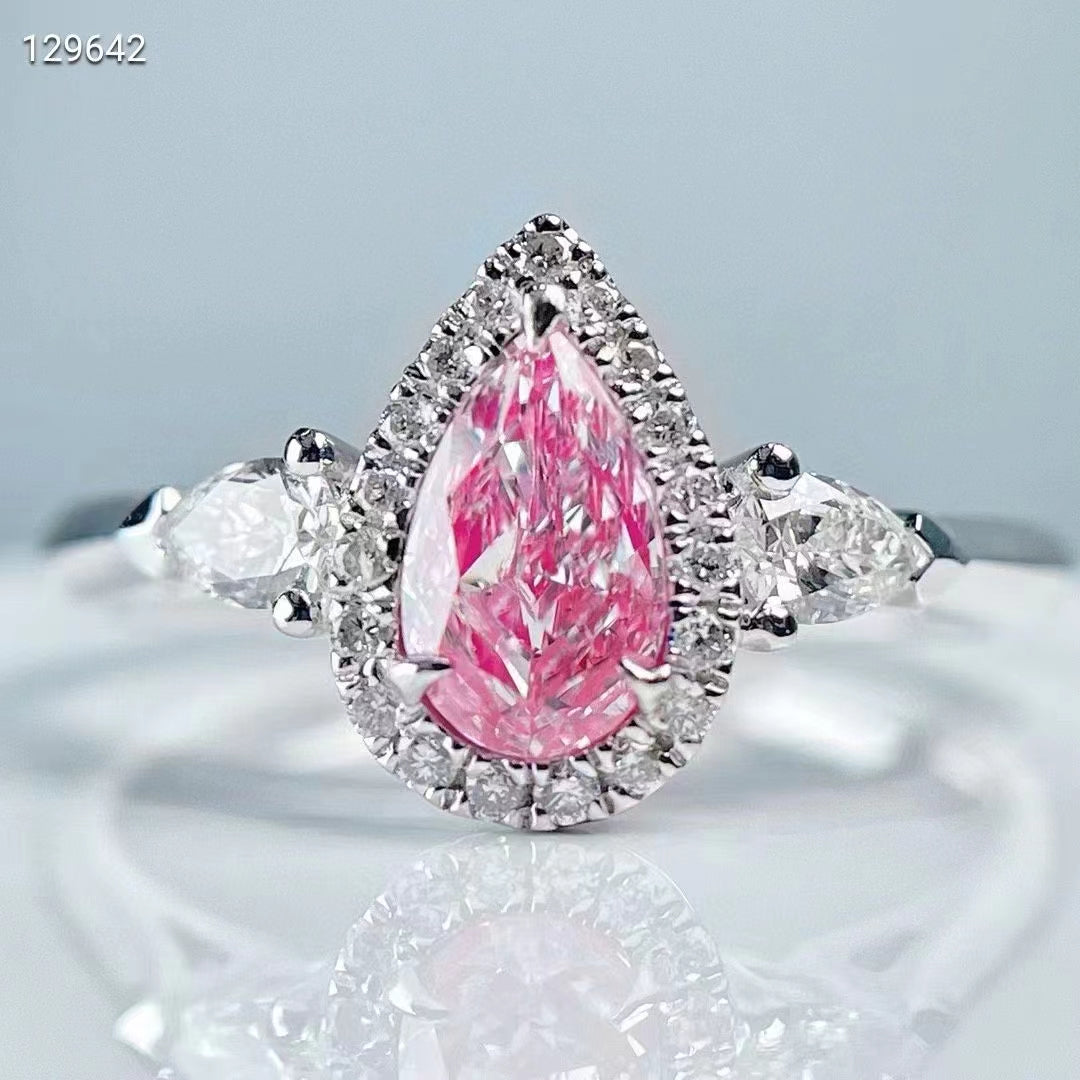 Lumière de Rose: 0.55 carat teardrop classic three-stone pink diamond ring in white gold