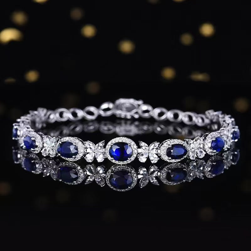 Die Tränen der Himmelskönigin – 18K Gold-Saphirarmband mit Diamanten