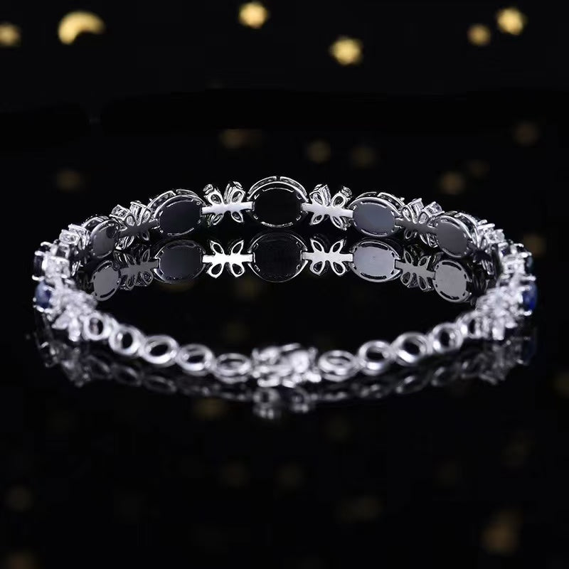 Die Tränen der Himmelskönigin – 18K Gold-Saphirarmband mit Diamanten