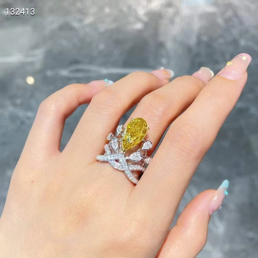 Sunrays of Elegance: 4 Carat GIA Yellow Diamond Ring