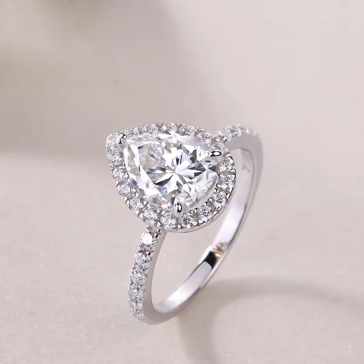 Radiant shine: 1.5 carat pear cut moissanite ring