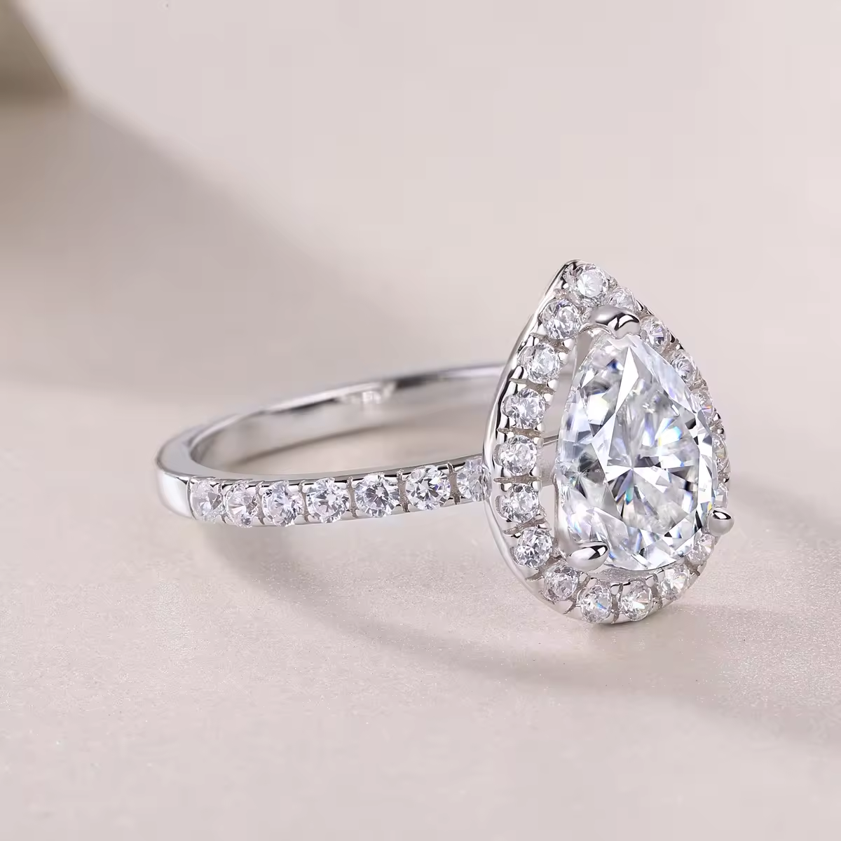 Radiant shine: 1.5 carat pear cut moissanite ring