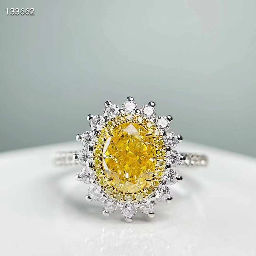 Sunrise of Elegance – NGTC certified 18k gold ring with 1.12ct oval natural yellow diamond