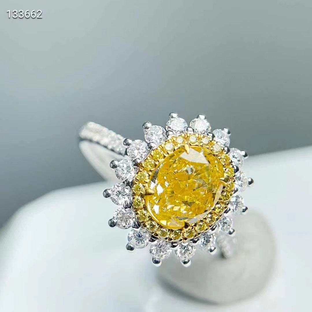 Sunrise of Elegance – NGTC certified 18k gold ring with 1.12ct oval natural yellow diamond