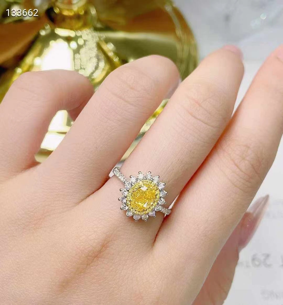 Sunrise of Elegance – NGTC certified 18k gold ring with 1.12ct oval natural yellow diamond