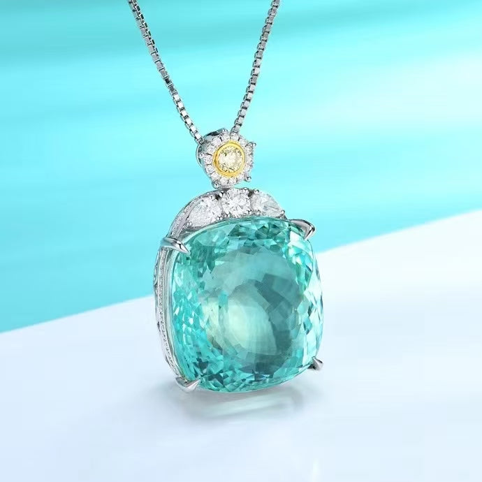 Radiant deep sea: The 18K gold Paraiba pendant