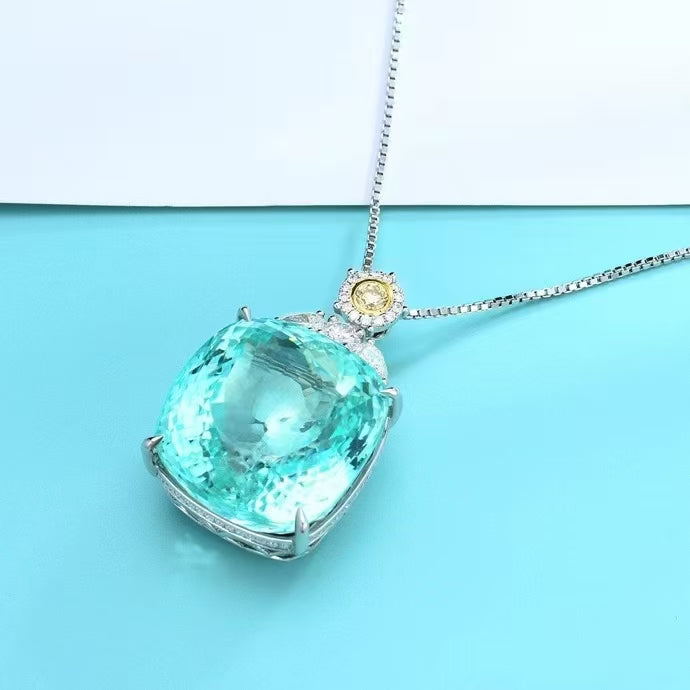 Radiant deep sea: The 18K gold Paraiba pendant