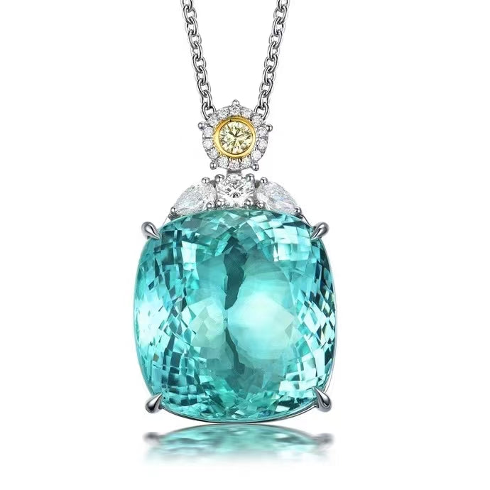 Radiant deep sea: The 18K gold Paraiba pendant