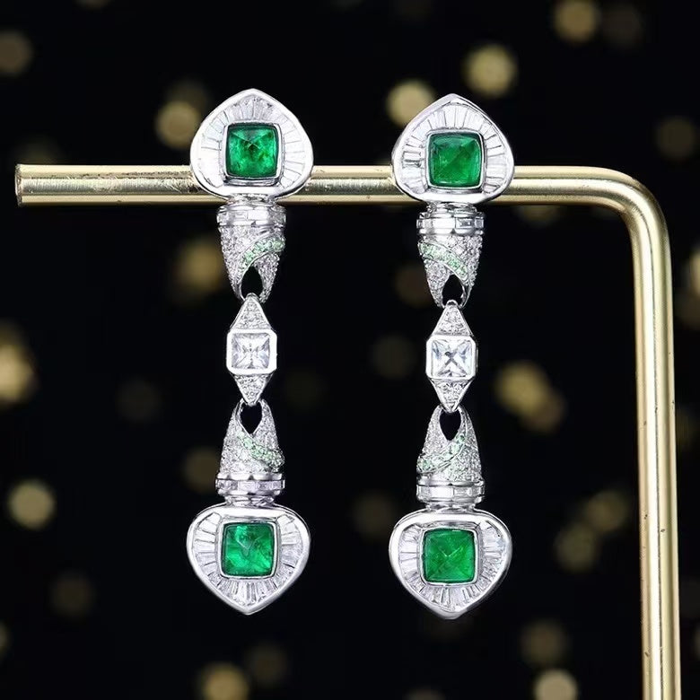 Jewel of splendor: 18K gold emerald stud earrings with 1.41ct natural emerald