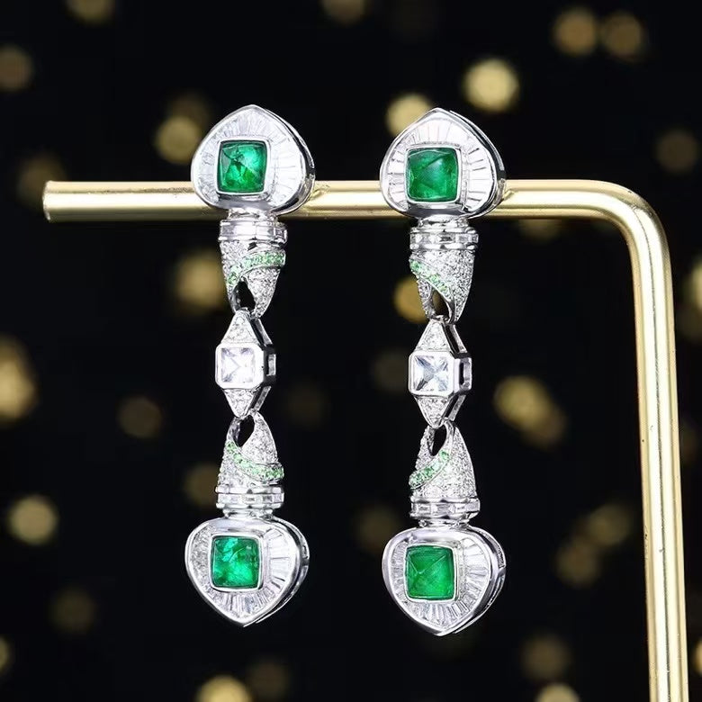 Jewel of splendor: 18K gold emerald stud earrings with 1.41ct natural emerald