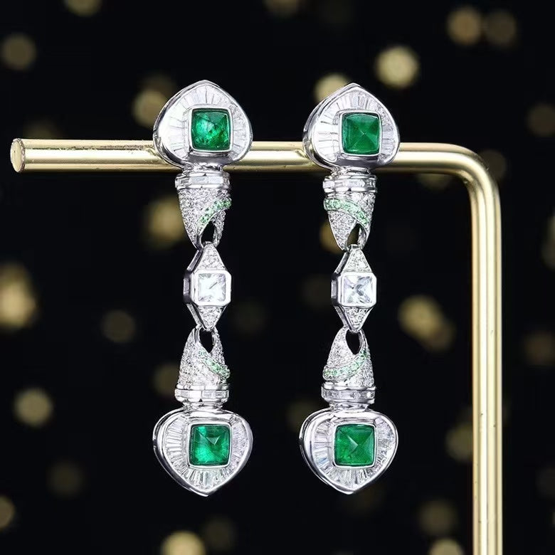 Jewel of splendor: 18K gold emerald stud earrings with 1.41ct natural emerald