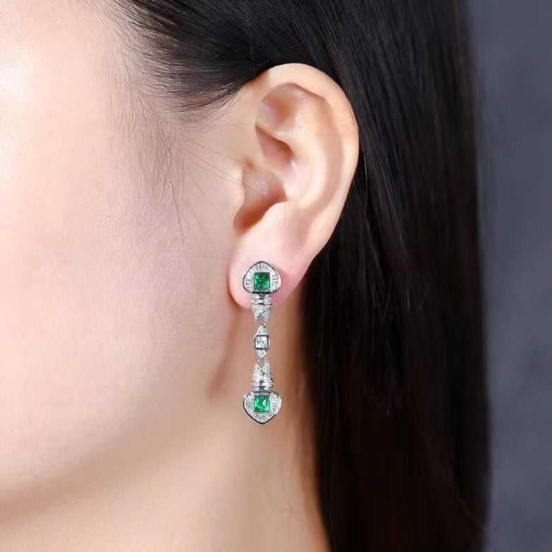 Jewel of splendor: 18K gold emerald stud earrings with 1.41ct natural emerald