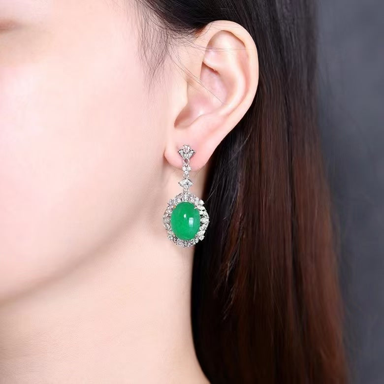 Eternal luxury: 18K gold earrings with 22.98ct natural emerald