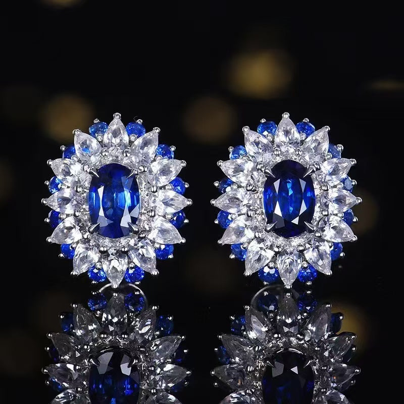 Sapphire dream in royal blue: Elegant 18K gold earrings with Sri Lanka sapphire