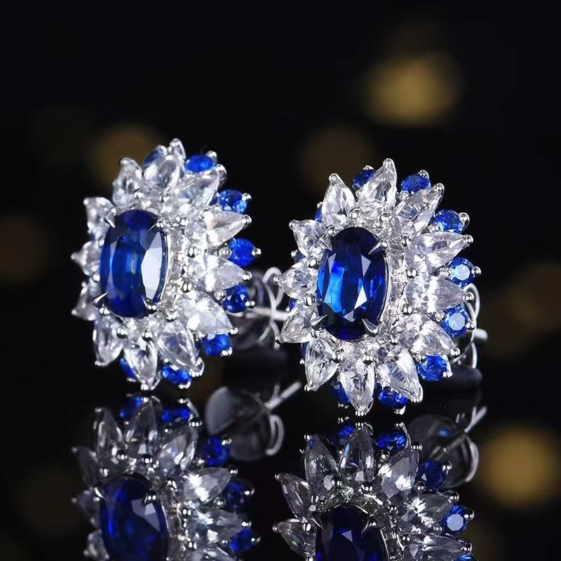 Sapphire dream in royal blue: Elegant 18K gold earrings with Sri Lanka sapphire